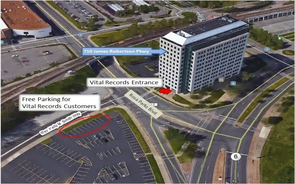 A detailed highlights the convenient location of complimentary parking available for customers seeking vital documentation, adjacent to a government building identified by its address on James Robertson Parkway, with a clearly marked entrance for records retrieval.